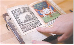The Book of Hours, a 16th century prayer book, was donated 100 years ago to the Indiana State Library and is now one of the oldest items in the division of rare books and manuscripts. Kelly Lafferty Gerber | CNHI News Indiana
