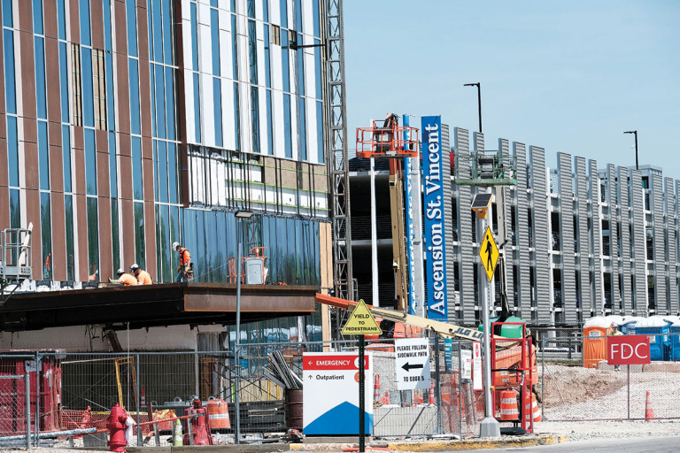 The six-story Women & Children’s Tower under construction on the hospital’s West 86th Street campus will feature both private neonatal intensive care unit rooms and pediatric intensive care unit rooms. (IBJ photo/Eric Learned)