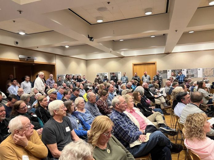 A crowd gathers to comment about a proposed solar farm facility during a zoning hearing in Bartholomew County in February.
