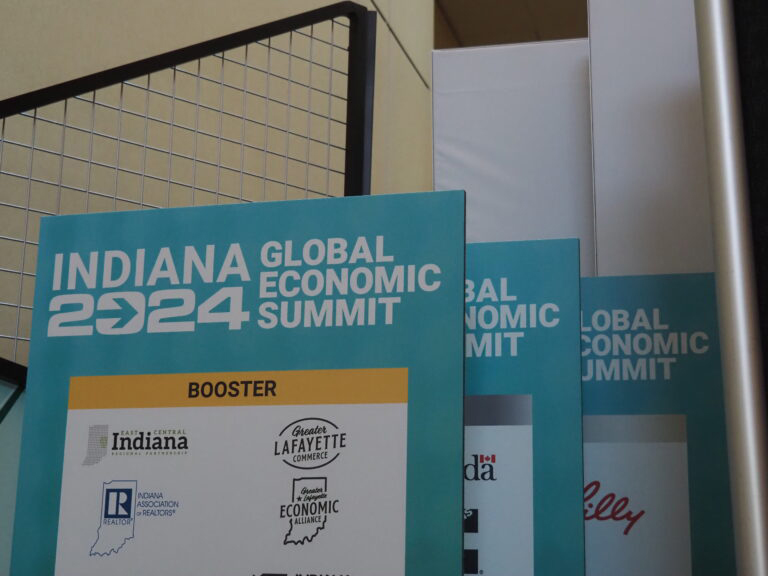 Signage for the 2024 Global Economic Summit stands in the Indiana Convention Center on Tuesday, May 21, 2024. (Leslie Bonilla Muñiz/Indiana Capital Chronicle)
