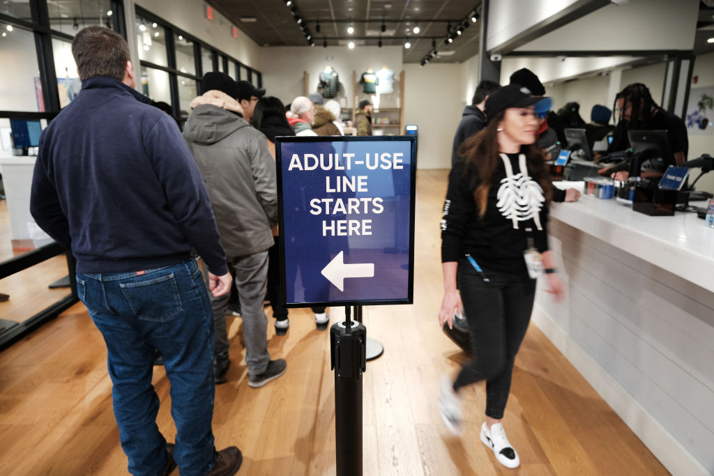 People wait in line at RISE Medical Marijuana Dispensary on the morning that cannabis sales become legal in New Jersey on April 21, 2022 in Paterson, New Jersey. (Spencer Platt/Getty Images)