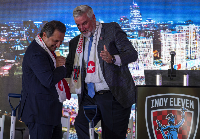 Indy Eleven owner Ersal Ozdemir (left) and Indiana Gov. Eric Holcomb at a groundbreaking ceremony in May 2023 for what was to be Eleven Park. (IBJ photo/Mickey Shuey)

