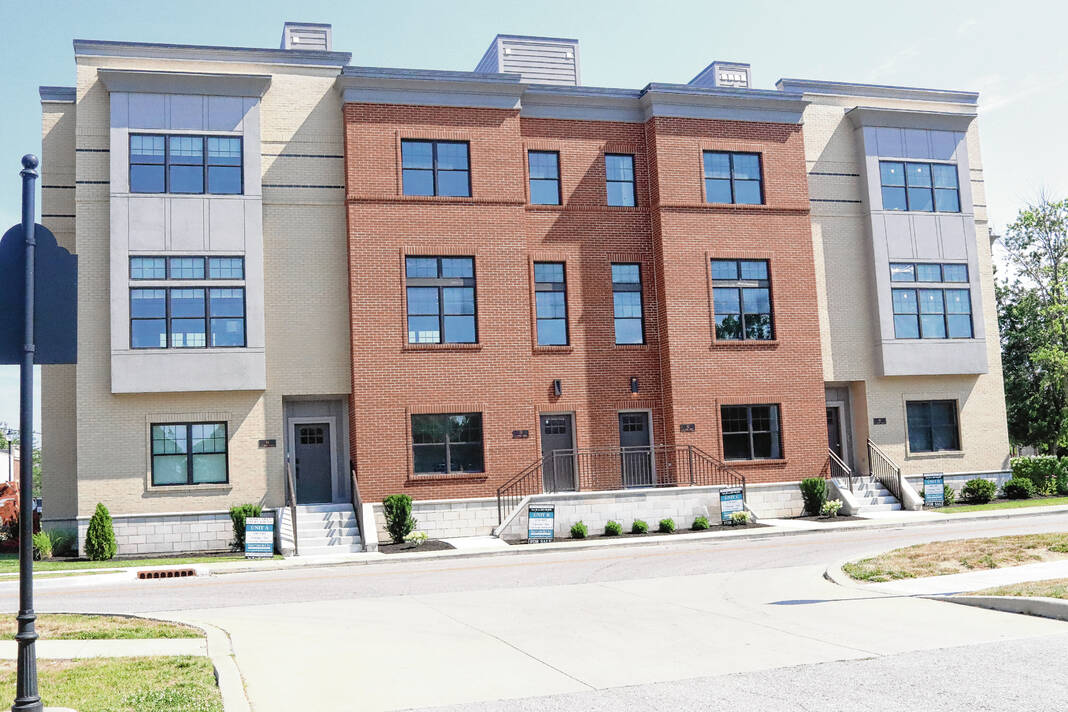 The modern facade of 150 South Main Condos rises up over downtown Franklin. The condo complex is selling now, with all dozen of the units still available for purchase. Elissa Maudlin | Daily Journal