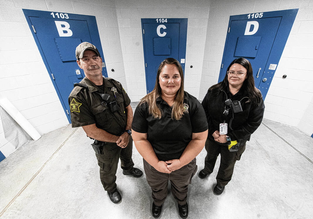 Officials with the Hancock County Jail have started a new operation called JIT — the Jail Investigative Team — which handles issues with inmates while they are in jail. JIT officers, left to right, Rickey Whittier, Nichole Stark and Ora Carr. Tom Russo | Daily Reporter