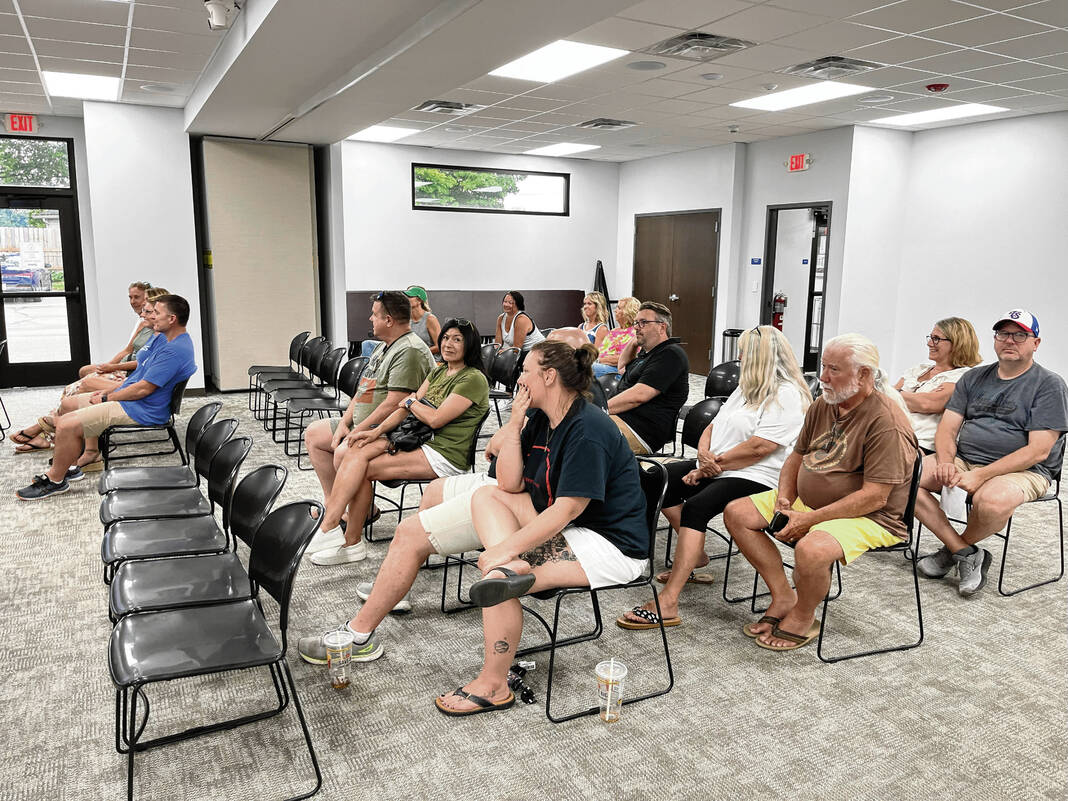 Business owners listen to members of the Fortville Town Council speak at the council’s July 15 meeting. Staff photo by Cori Jobman