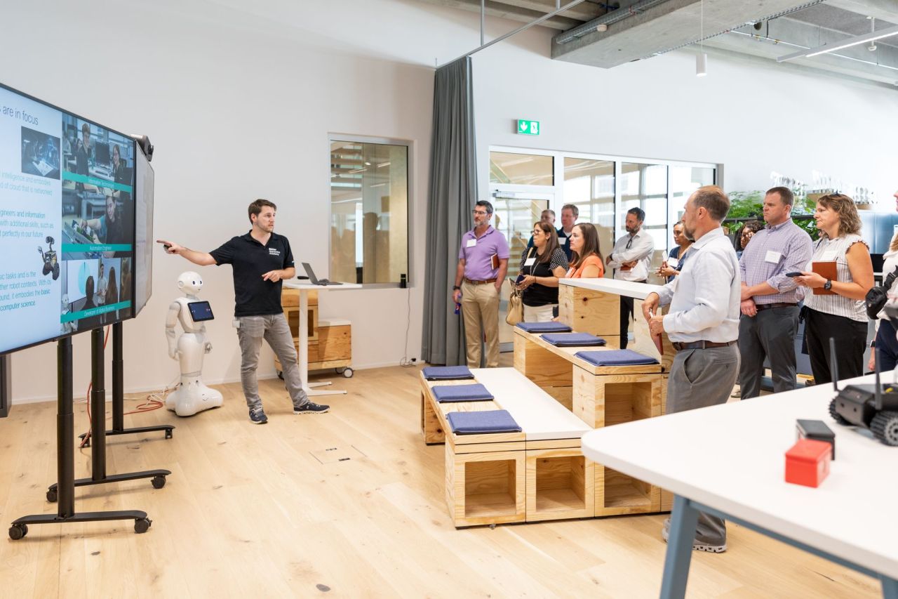  Representatives of Indiana industry meet with meet with leaders from REGO-FIX AG at their headquarters in Switzerland in June of this summer. (Photo Courtesy of the Richard M. Fairbanks Foundation)
?