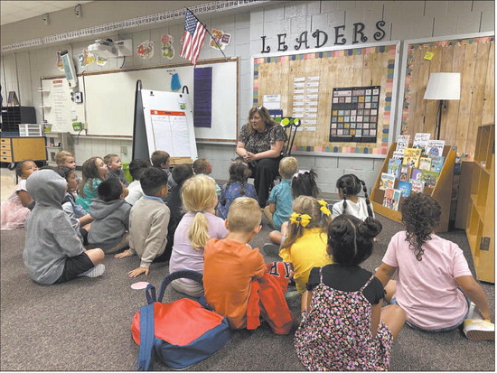 Ox Bow Elementary School kindergarten teacher Kara Coryn talks to her class on the first day of school. Photo contributed
