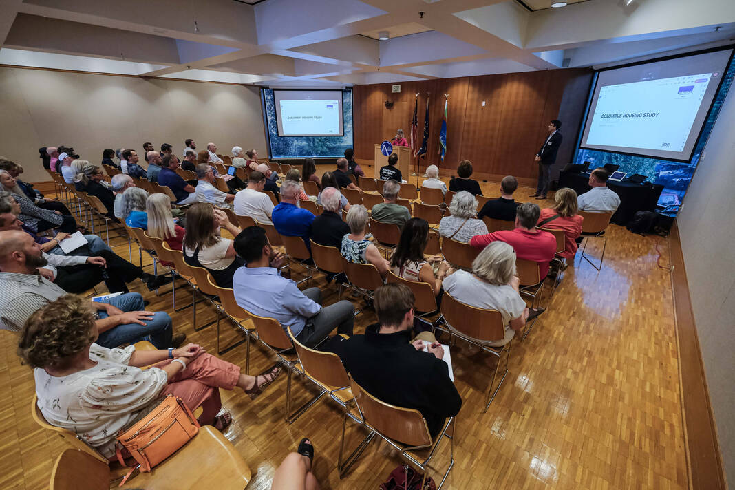 People gather to hear the overview of a housing study by RDG Planning and Design at Columbus City Hall in Columbus, Ind., Thursday, Sept. 19, 2024. Staff photo by Mike Wolanin