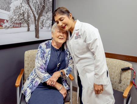 Dr. Sarah Thomas, right, has treated Mary Beth Zolezzi for years for arthritis. Zolezzi now has to find a new doctor because Thomas’ employer is no longer in-network for Zolezzi’s insurance. (IBJ photo/Chad Williams)