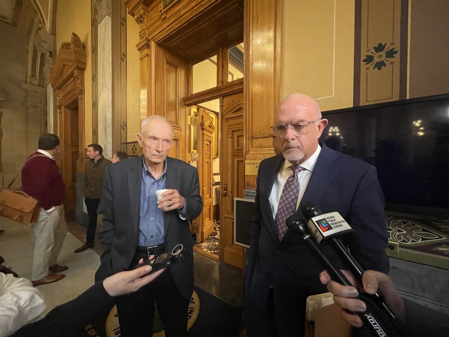 Indiana tax task force co-leaders Rep. Jeff Thompson, R-Lizton, (left) and Sen. Travis Holdman, R-Markle talk to reporters after their group released legislative suggestions on Wednesday, Nov. 20, 2024. (Leslie Bonilla Muñiz/Indiana Capital Chronicle)