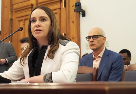  Indiana Medicaid Director Cora Steinmetz appears before the State Budget Committee on Dec. 17, 2024, while FSSA Secretary Dan Rusyniak listens. (Whitney Downard/Indiana Capital Chronicle)