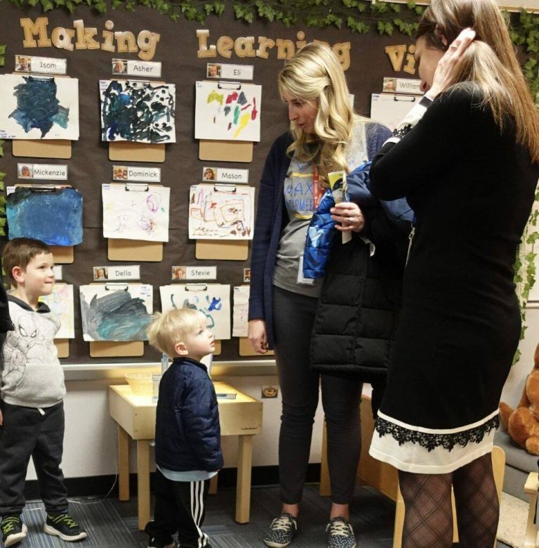 Staff members at Greenfield-Central’s Cougar Cubs preschool chat with young learners in this photo from November. The Greenfield-Central school district will soon offer an apprenticeship program to jumpstart the career of future preschool and daycare teachers.