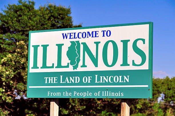 Sign at the state welcoming visitors to the State of Illinois. Bruce Leighty | Getty Images