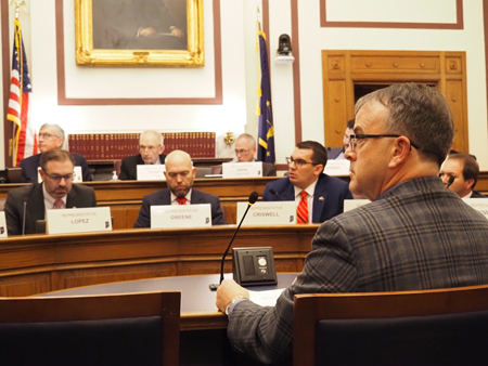 Terry Spradlin, the executive director of the Indiana School Boards Association, listens to a Ways and Means committee member on Feb. 6, 2025. (Whitney Downard/Indiana Capital Chronicle)