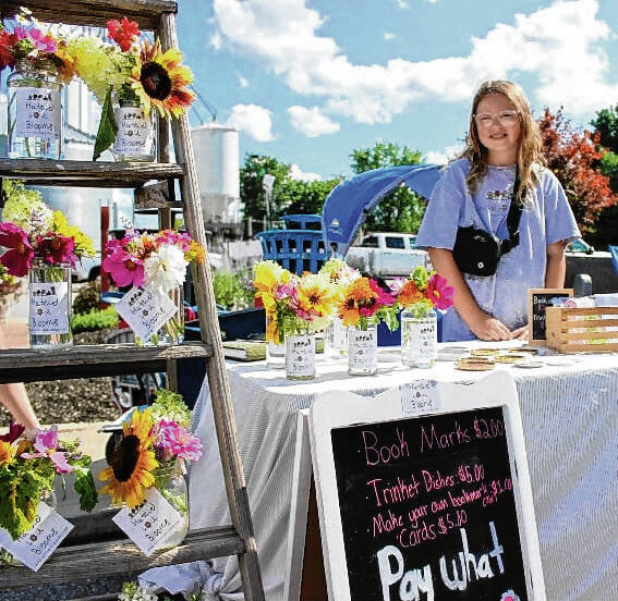Hattie Lou Bennett, founder of Hattie Lou Blooms, partnered with Patriot Products to create a pollinator garden on an unused patch of land. Daily Journal File Photo