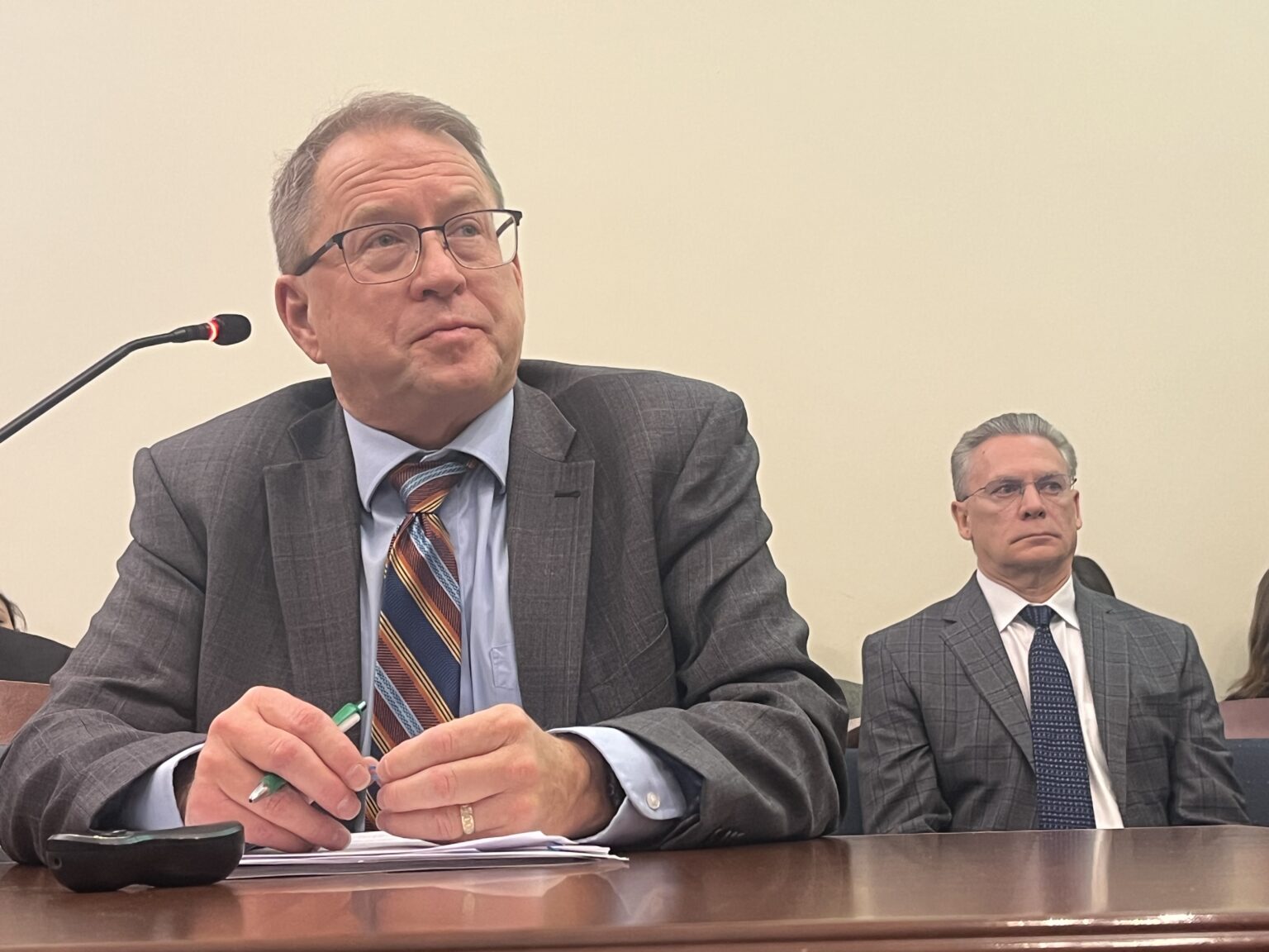 Hospital administrators like Baptist Health Floyd’s Michael Schroyer, left, and Goshen Health’s Randy Christophel, urged senators to reconsider a bill establishing “price caps” on their services. (Whitney Downard/Indiana Capital Chronicle)