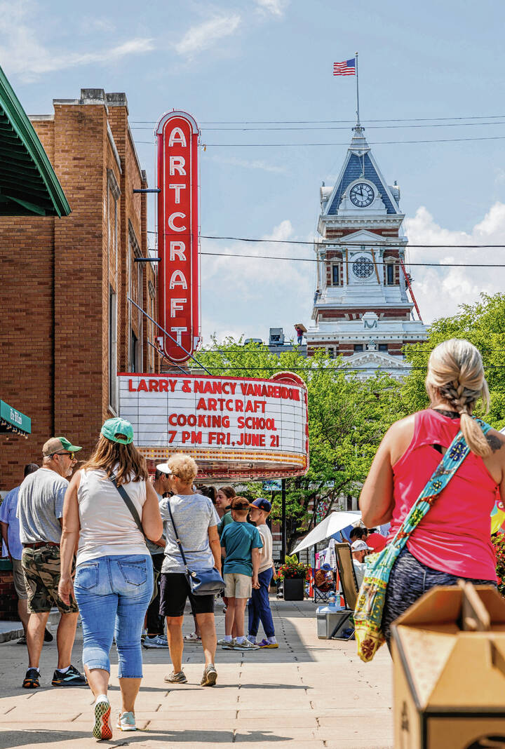 Shoppers wander among artists’ booths during Ethos Celebration of the Arts in downtown Franklin in 2024. With an economic development grant from the city, the Historic Artcraft Theatre will host live performance events. Submitted photo