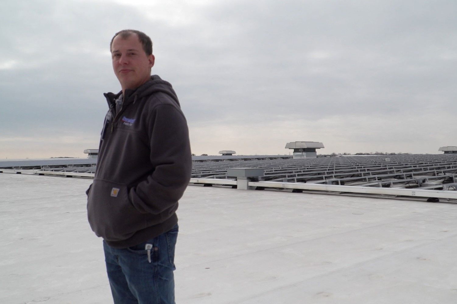 Tyler Gerardot is an electrical maintenance technician Sweetwater Sound. He maintains the company's 260 rooftop solar panels. (Alan Mbathi/IPB News)