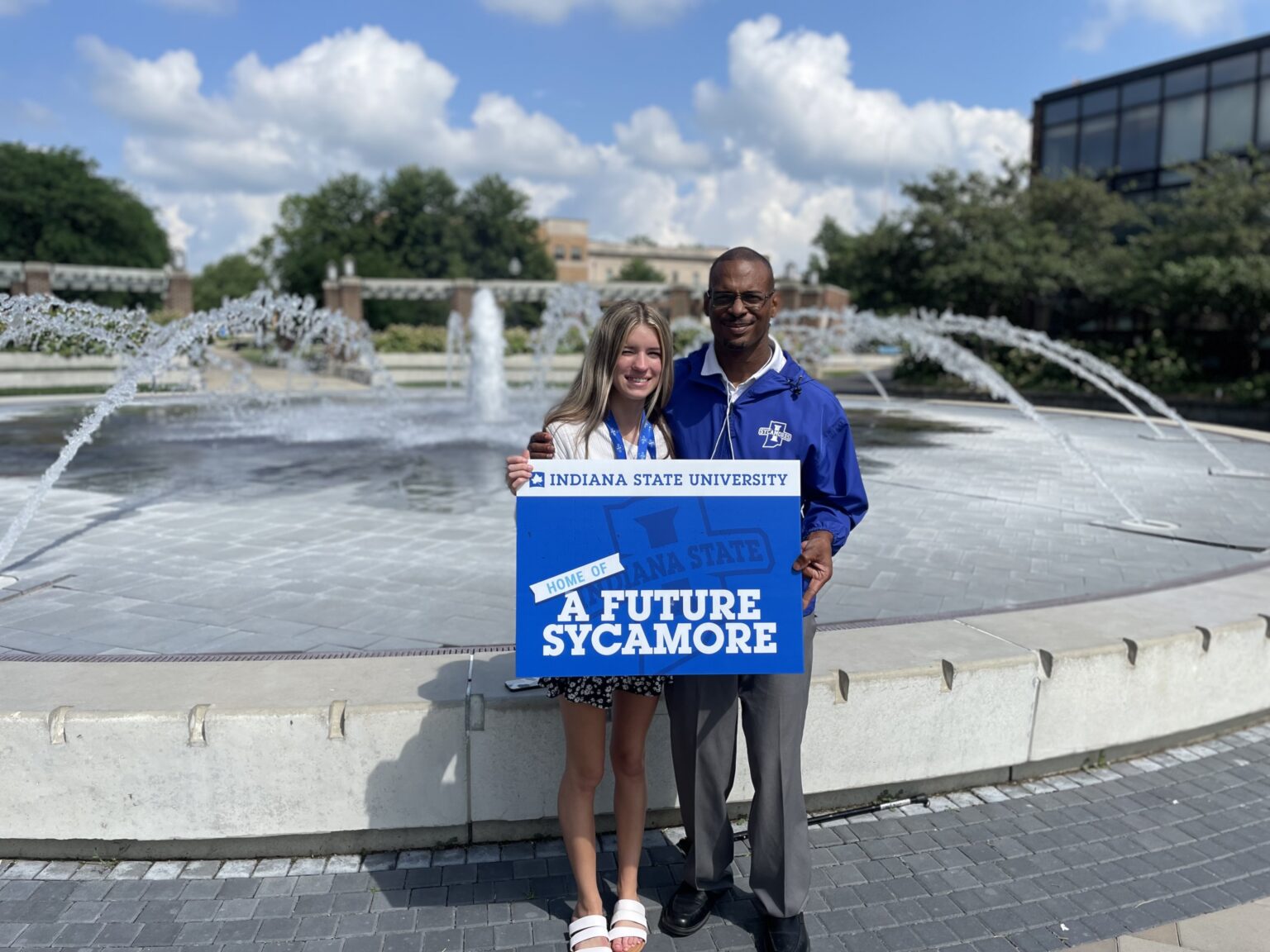 Bridgette Edwards poses with Karl Turk, the Jobs for America’s Graduates specialist who has become a “father figure,” during a June 2025 visit to her chosen Indiana State University. (Courtesy photograph)