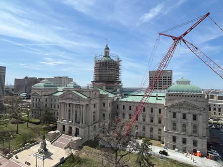 The Indiana Statehouse — adorned with scaffolding for a roofing project — on March 28, 2025. (Niki Kelly/Indiana Capital Chronicle)