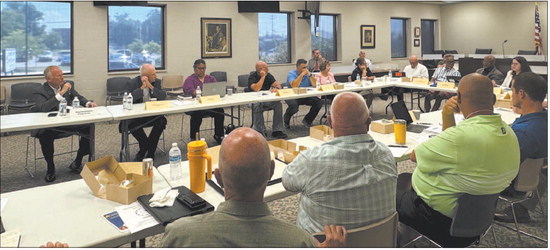 State Rep. Joanna King (R-Middlebury) (seventh from left) listens to Elkhart County officials during a meeting to discuss Senate Enrolled Act 1 on Thursday, Aug. 14, at the Elkhart County Administration Building in Goshen. King and other lawmakers were there to discuss property tax relief and reform. Others pictured are, from left, State Rep. Craig Snow (R-Warsaw), State Rep. Jeff Thompson (R-Lizton), House Fiscal Analyst, Wakarusa Town Manager Rob Slagle, Wakarusa Town Council President Rocco Rigsby, State Sen. Linda Rogers (R-Granger) and State Rep. Doug Miller (R-Elkhart). Photo by Dani Messick | The Goshen News