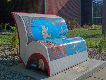 A book bench at the Greensburg Decatur County Public Library. (Photo by Noelle Maxwell for the Indiana Capital Chronicle)