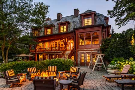 This lake home in Culver, Indiana, was owned by the late Indianapolis Colts owner Jim Irsay and was listed for $19.9 million. It includes eight bedrooms, 10 full bathrooms, and four fireplaces, among other amenities. (Photo courtesy of The Addison Group)