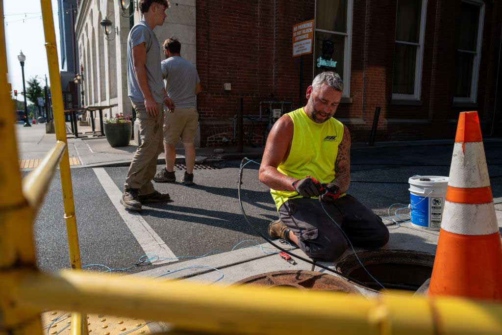 Indiana lawmakers are considering new legislation for the 2026 session to address dormant, abandoned and low-hanging utility lines left behind by telecommunications companies. (Photo by Spencer Platt/Getty Images)