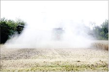 Grain dust as Hoosier farmers harvest millions of acres of corn and soybeans stirs up risk of lung ailments