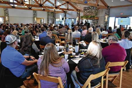 Local business leaders listen to panelists speak about the state, national and local economies during Aspire Johnson County’s Economic Outlook Breakfast on Thursday at The Sycamore at Mallow Run in Bargersville. Noah Crenshaw | Daily Journal