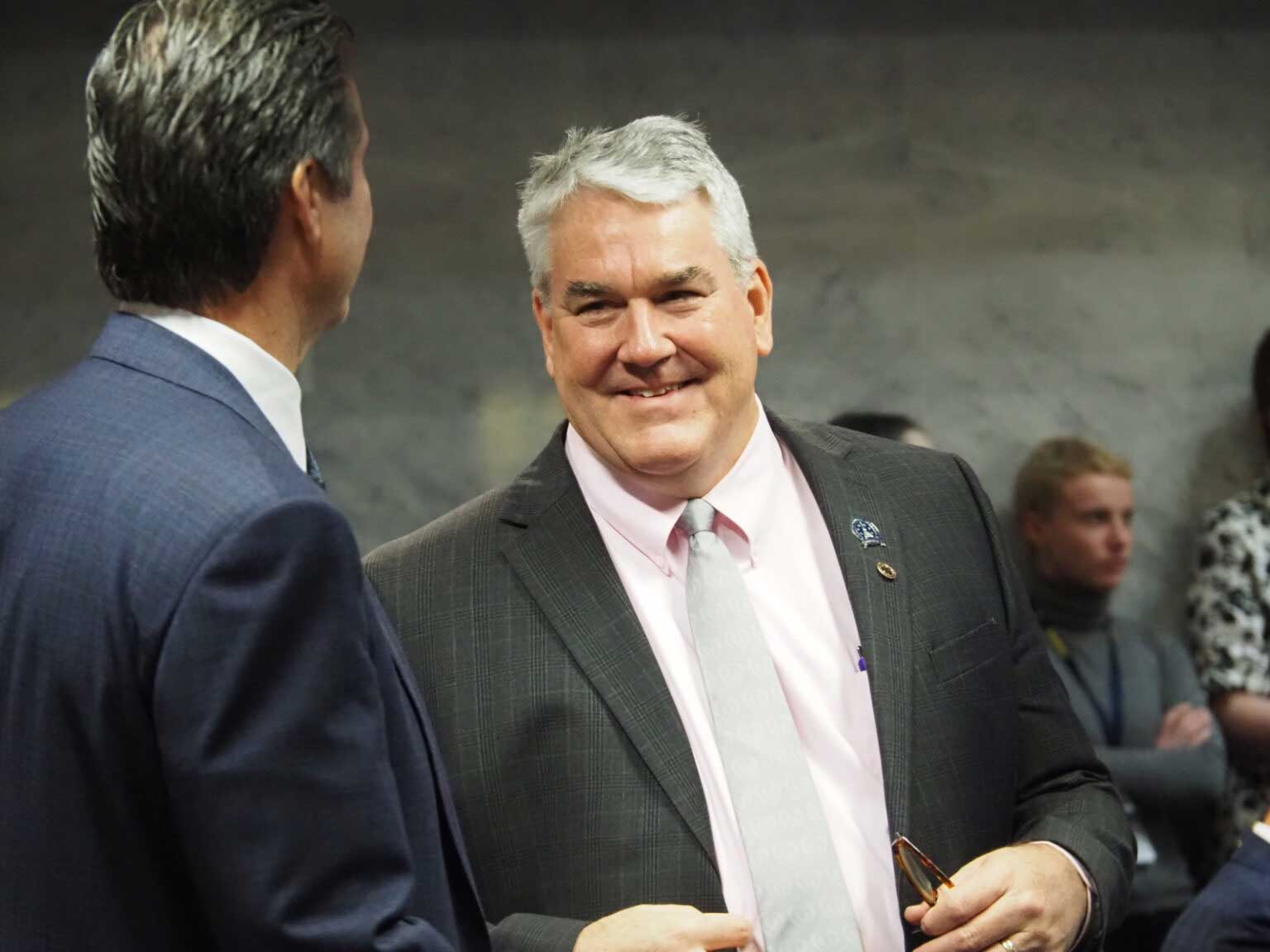 Sen. Andy Zay, R-Huntington, speaks with Sen. Ryan Mishler, R-Mishawaka, in the Senate chamber on Tuesday, Jan. 16, 2024. The congressional candidate is an outspoken Catholic. (Whitney Downard/Indiana Capital Chronicle)