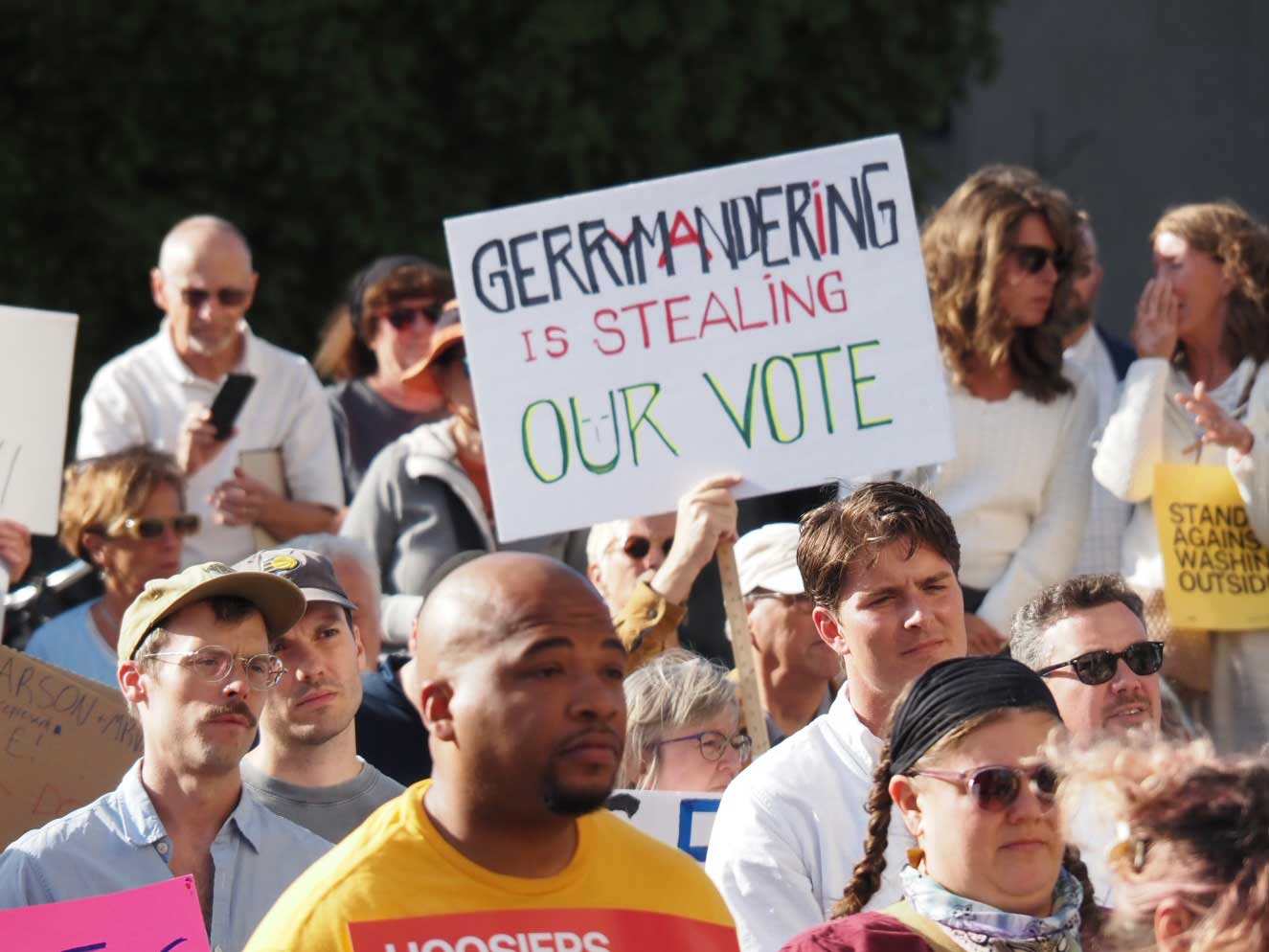 Hoosiers protest potential mid-cycle redistricting outside the Indiana Statehouse on Tuesday, August 26, 2025. (Leslie Bonilla Muñiz/Indiana Capital Chronicle)