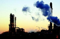 New Energy Corp., an ethanol plant on South Bend's southwest side, makes for a dramatic scene etched against a spring sunset. Tribune Photo/SANTIAGO FLORES