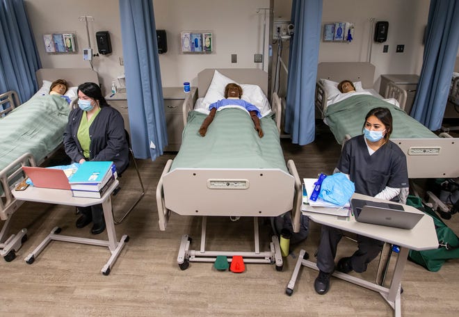 Ivy Tech nursing students look on during their first day of class Wednesday, Jan. 19, 2022 at Ivy Tech Community College in South Bend. Staff photo by Robert Franklin